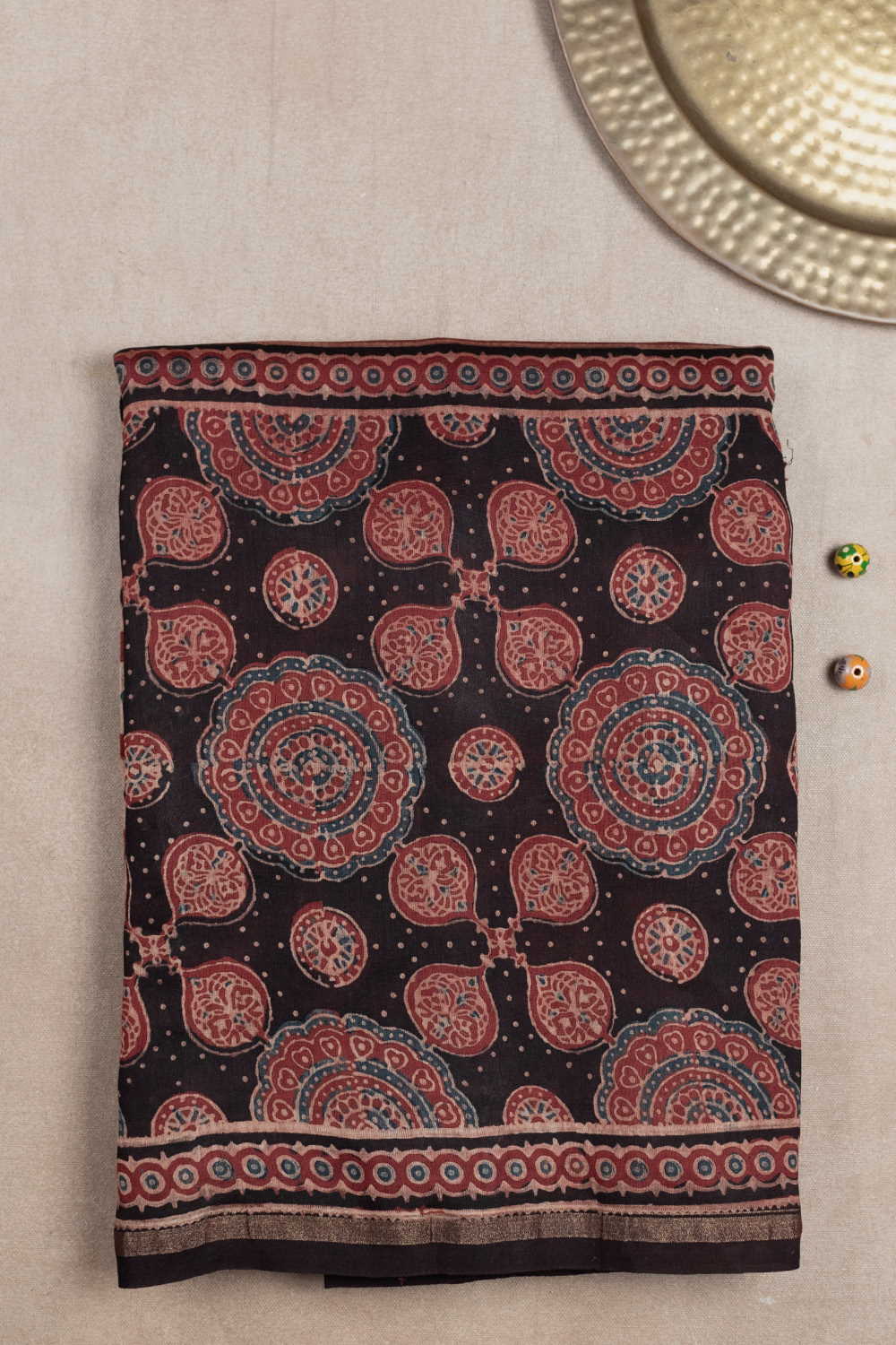 Motifs on Maroon Ajrak Chanderi saree