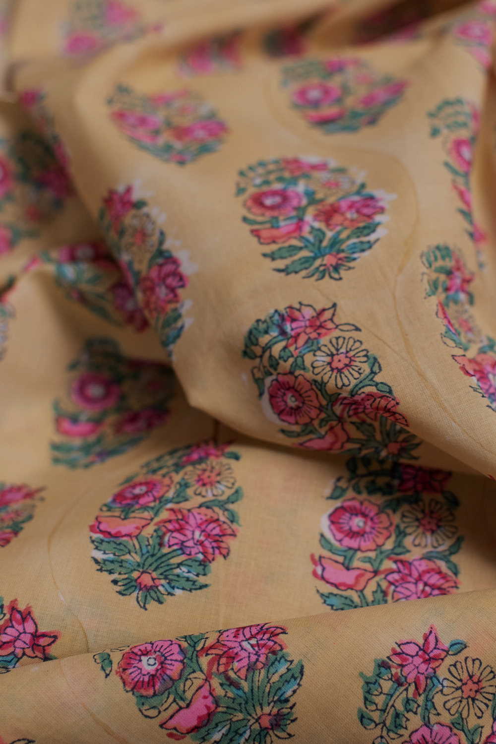 Buttas on Baby Yellow Sanganeri Cotton Fabric