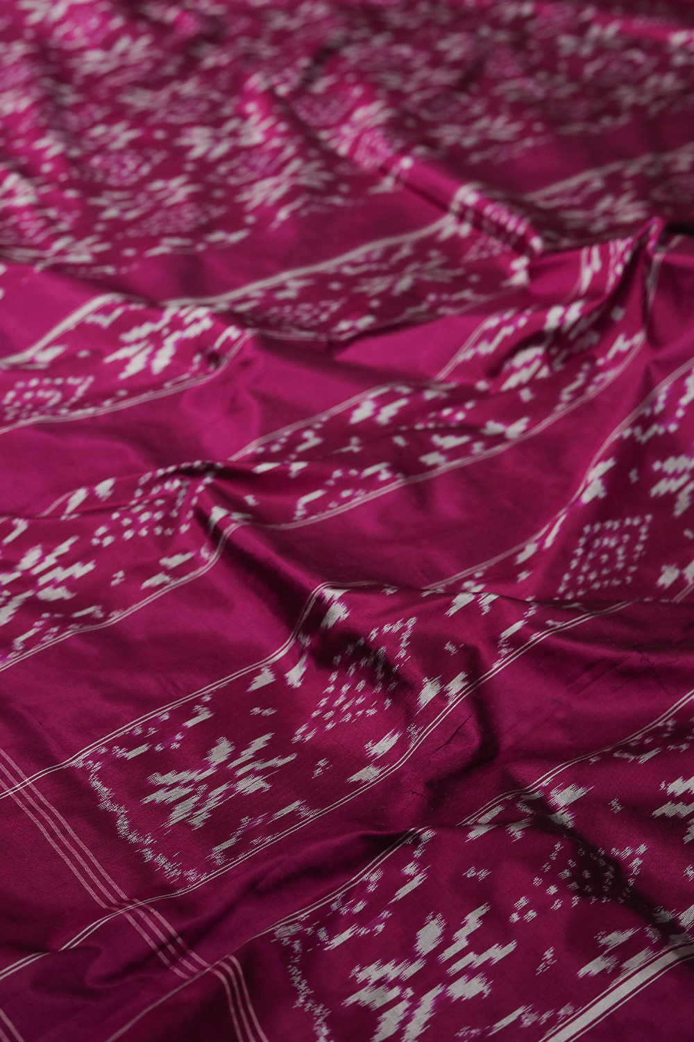 Shades of Deep Pink Ikat Silk saree
