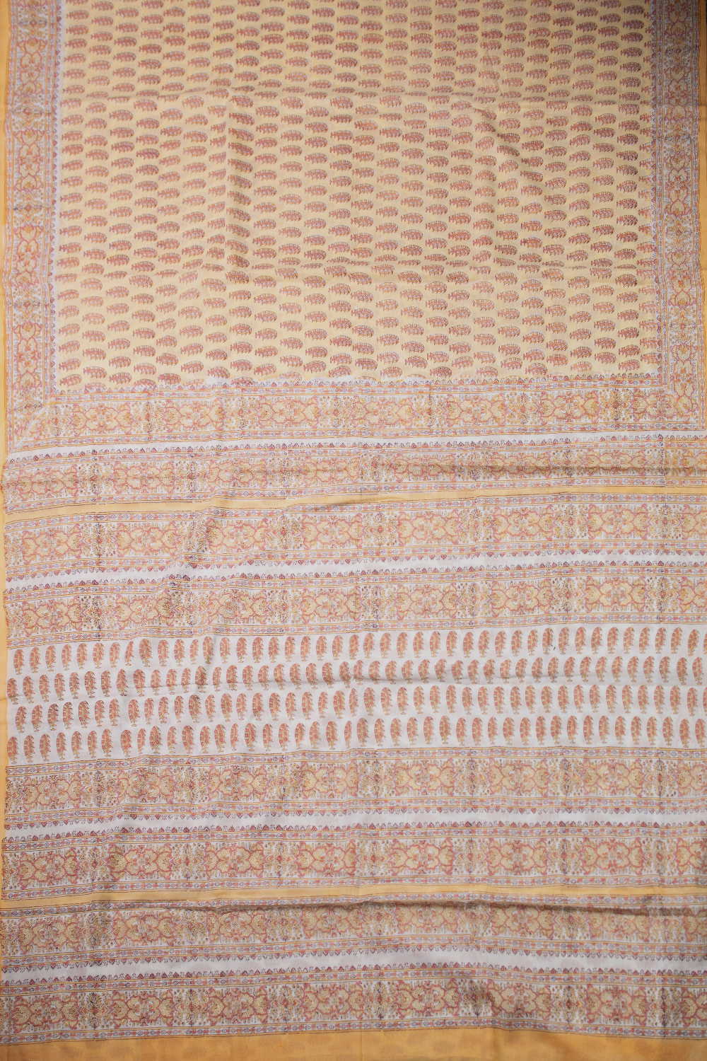 Motifs on Yellow Block Printed Mul Cotton saree