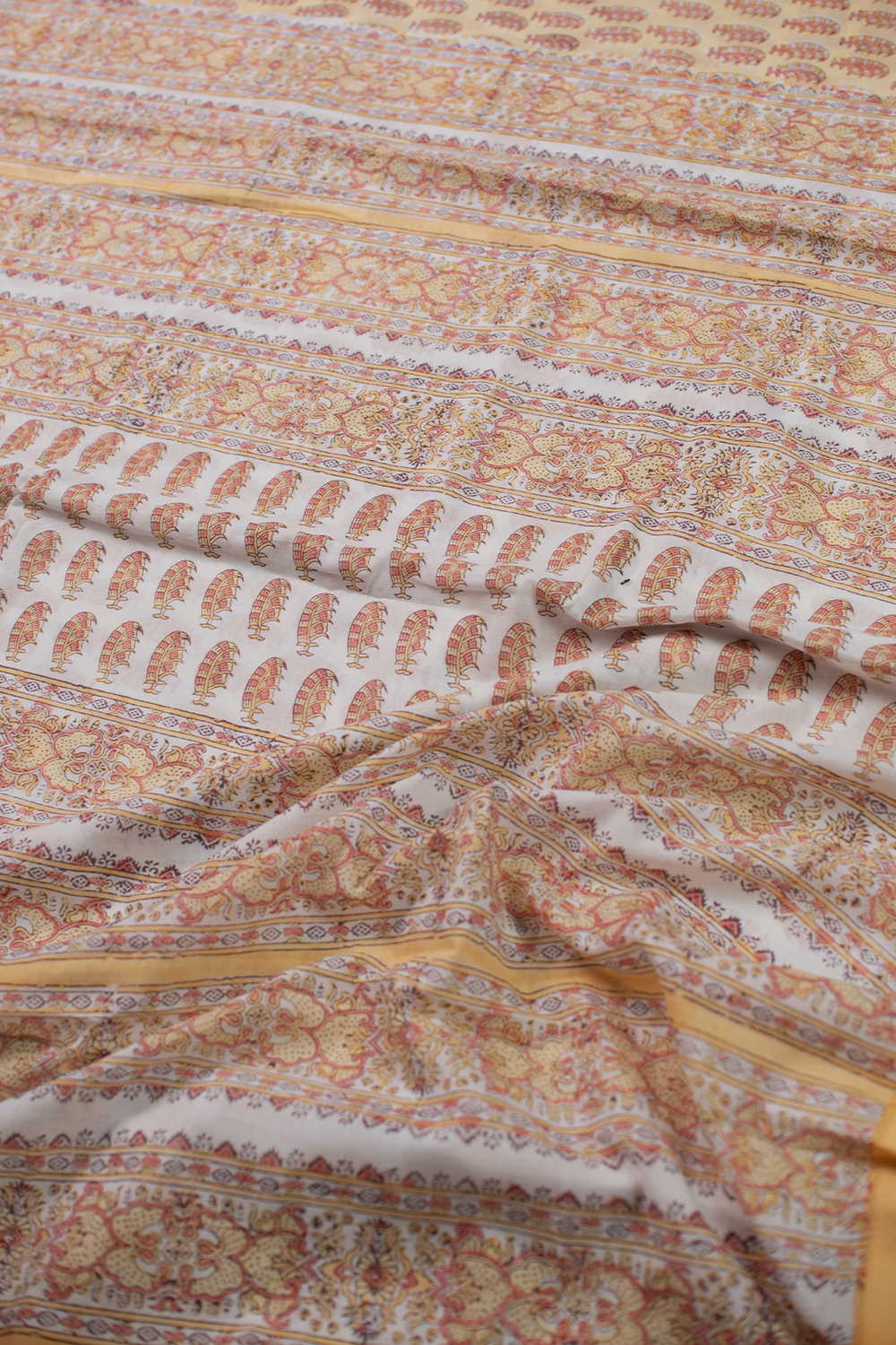 Motifs on Yellow Block Printed Mul Cotton saree