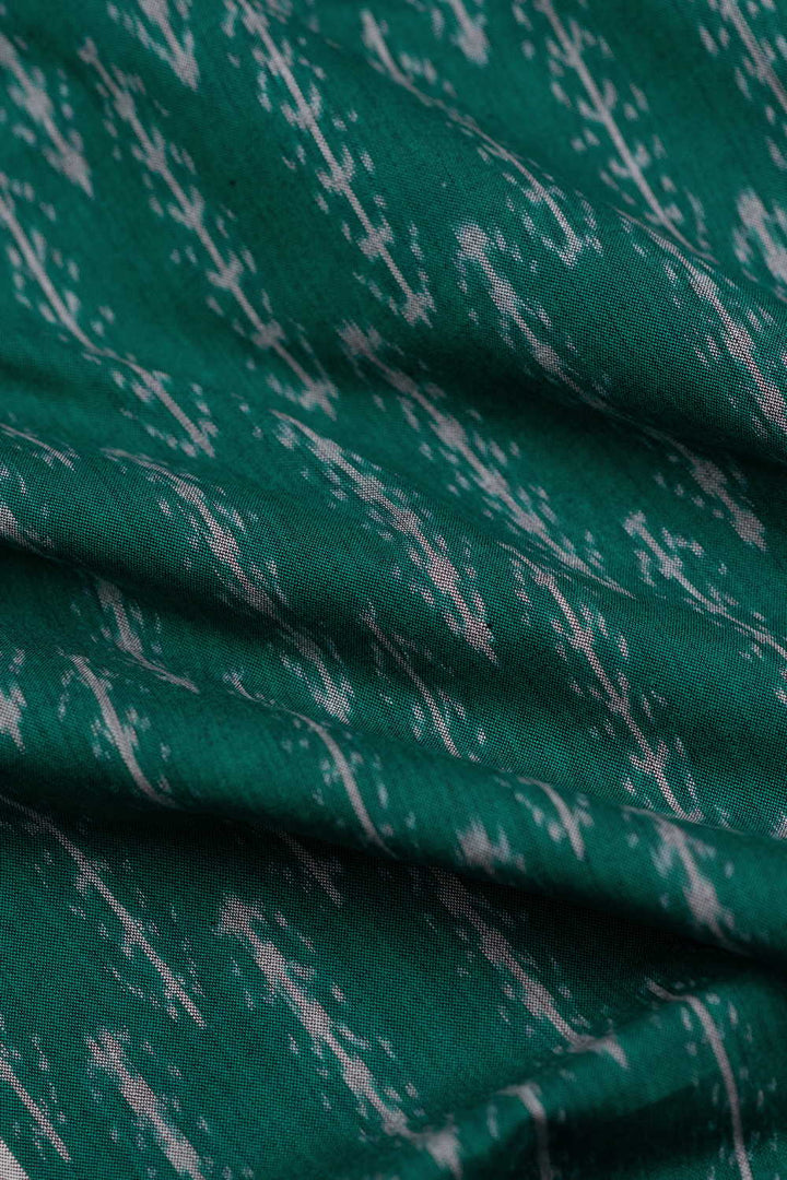 Pattern on Green Ikat Cotton Fabric