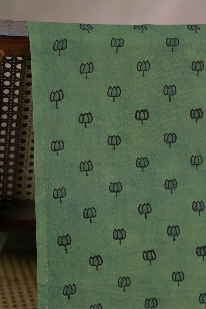 Lotus on Green Ajrak Cotton Fabric