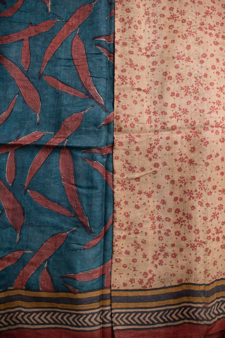 Patterns on Faded Blue Block Printed Tussar saree