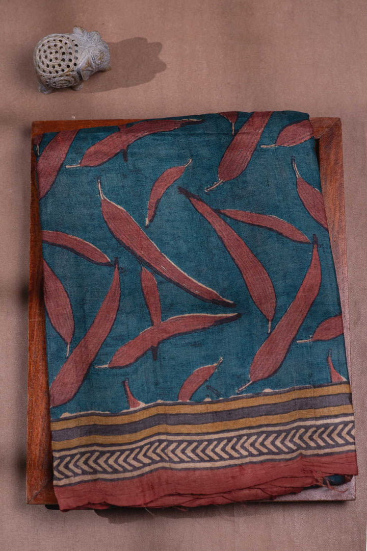 Patterns on Faded Blue Block Printed Tussar saree