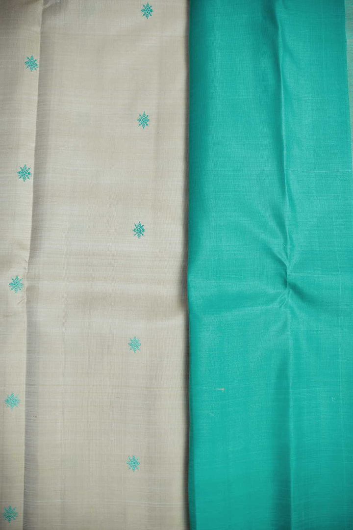 Green Thread Butta on Cream Kanchipuram Silk saree