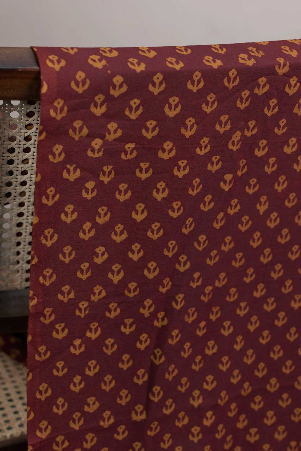 Little Yellow Motifs on Maroon Bagh Cotton Fabric - 1.6m