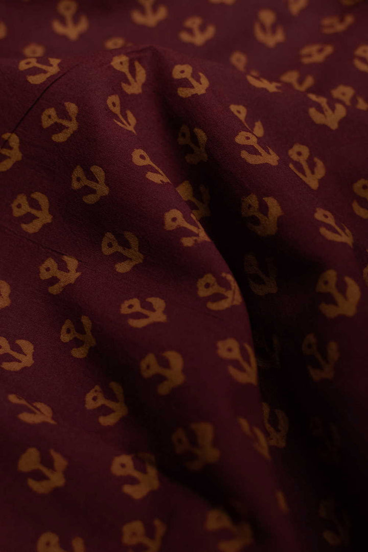 Little Yellow Motifs on Maroon Bagh Cotton Fabric - 1.6m