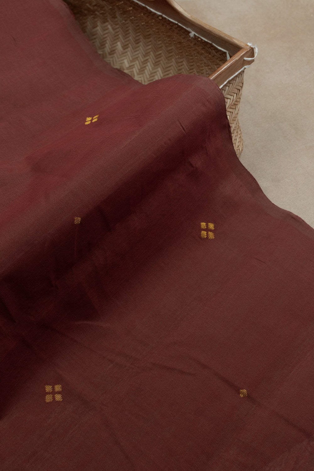 Golden Butta on Maroon Handwoven Cotton Fabric