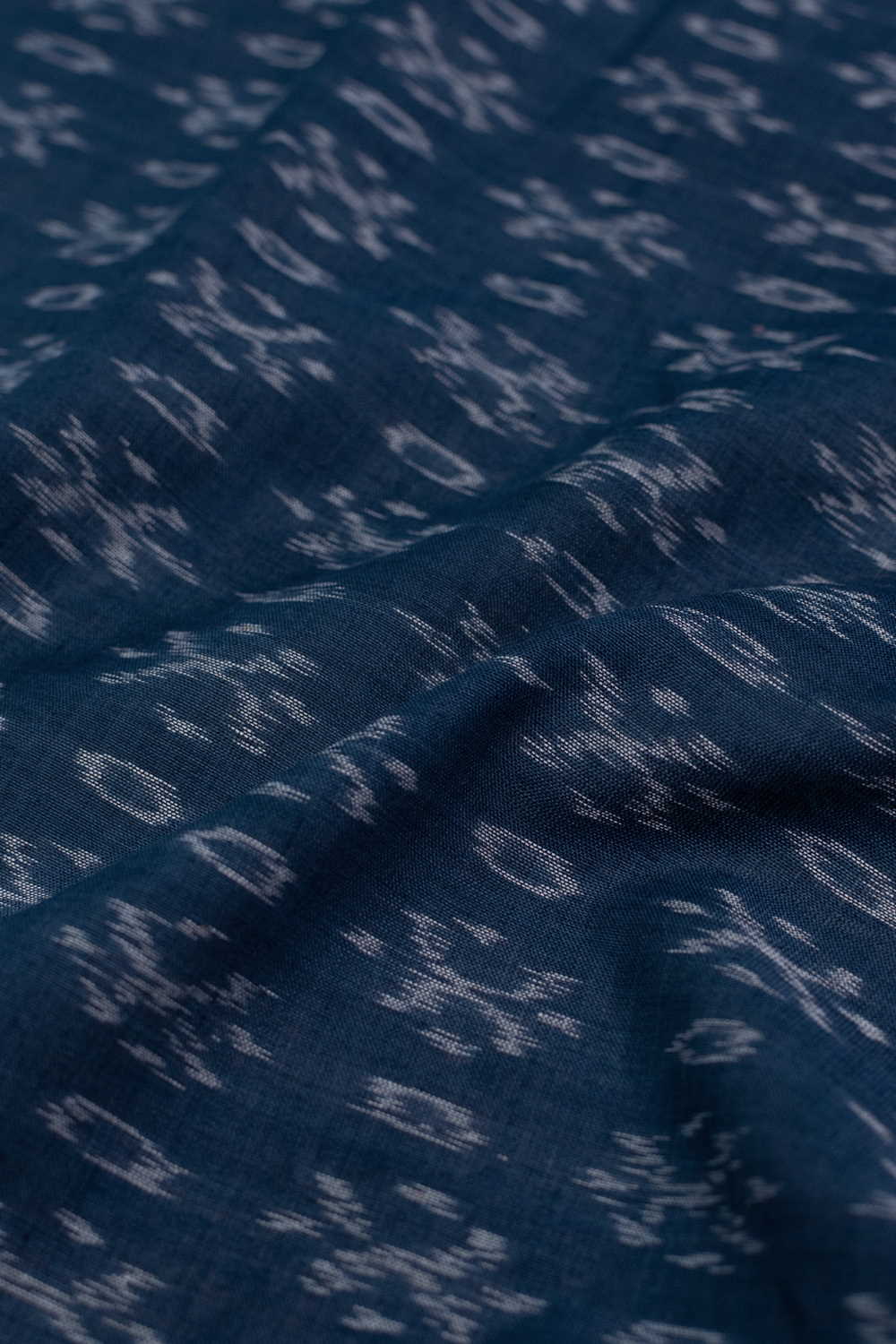 Cream Motifs Orissa Ikat Cotton Fabric
