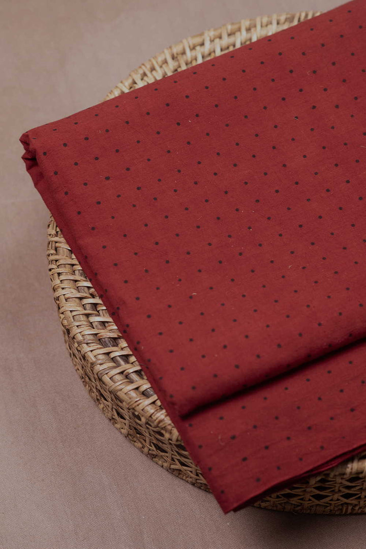 Dots on Maroon Ajrak Cotton Fabric