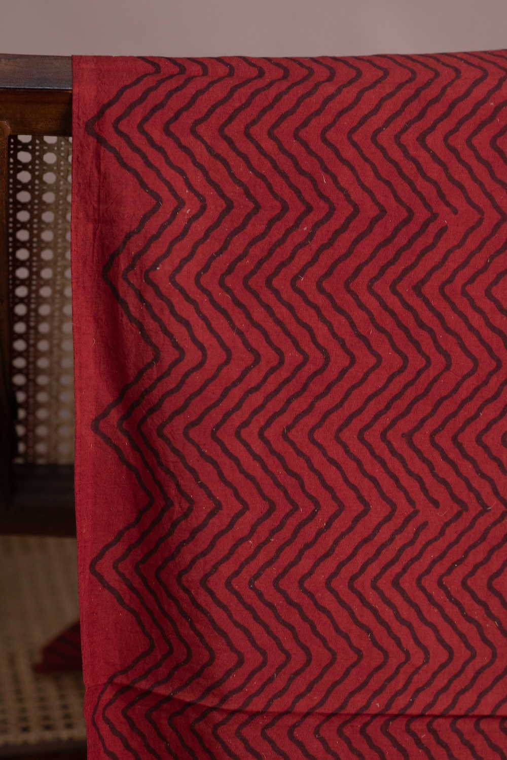 Chevron Pattern on Maroon Ajrak Cotton Fabric