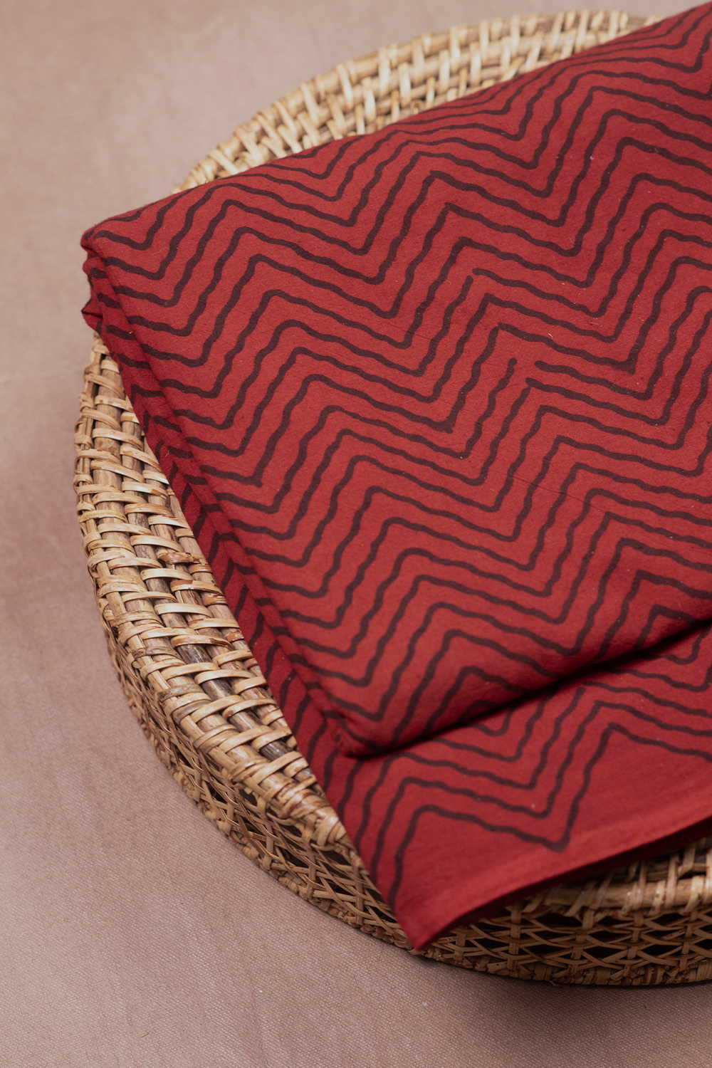Chevron Pattern on Maroon Ajrak Cotton Fabric