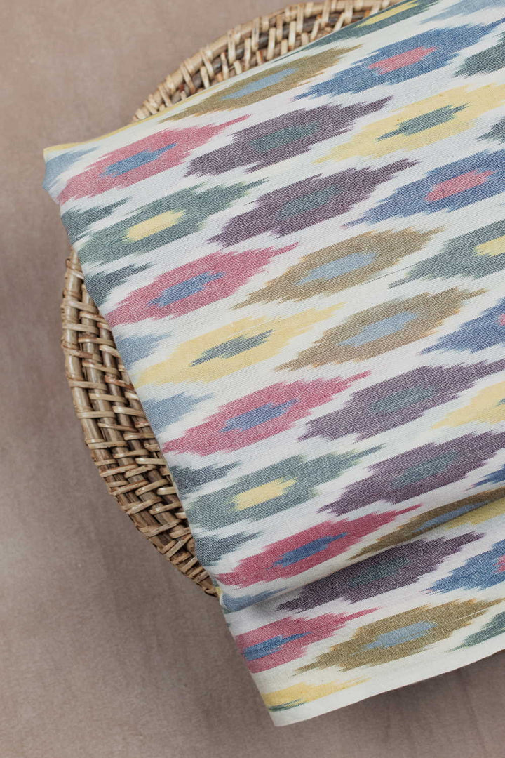 Multi-Color on Cream Ikat Cotton Fabric
