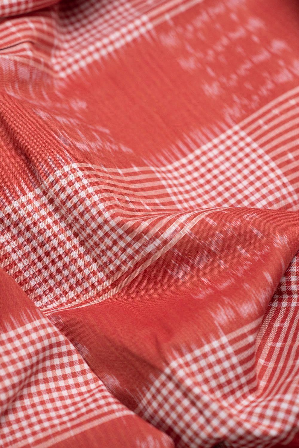 Pattern on Rust Orange Ikat Cotton Fabric