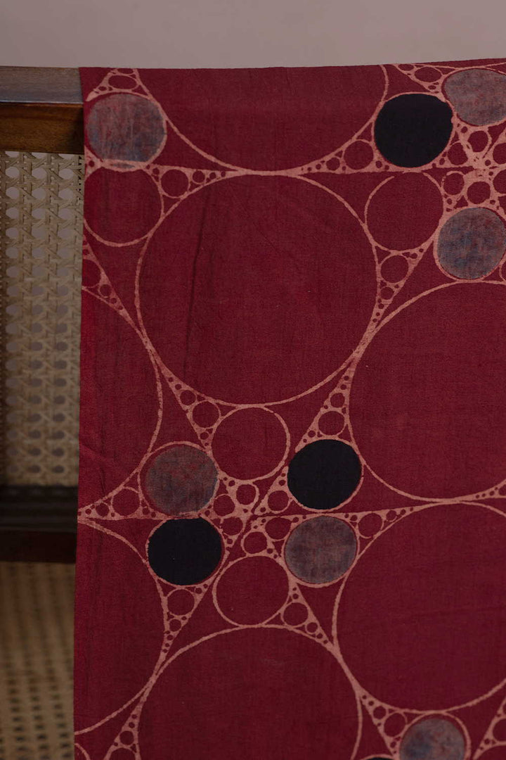 Irregular Circles on Maroon Ajrak Cotton Fabric