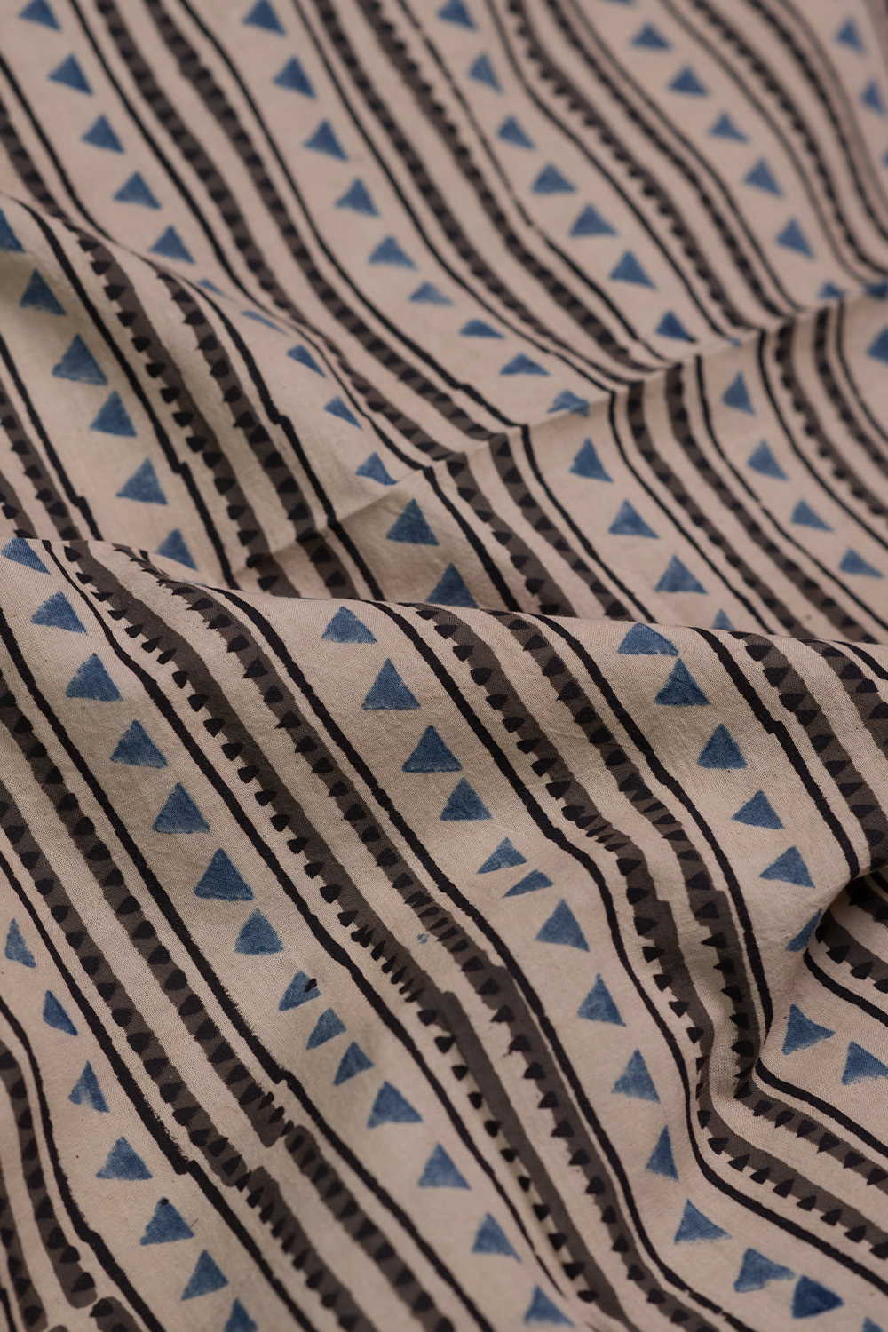 Angular Stripes on Cream Ajrak Cotton Fabric