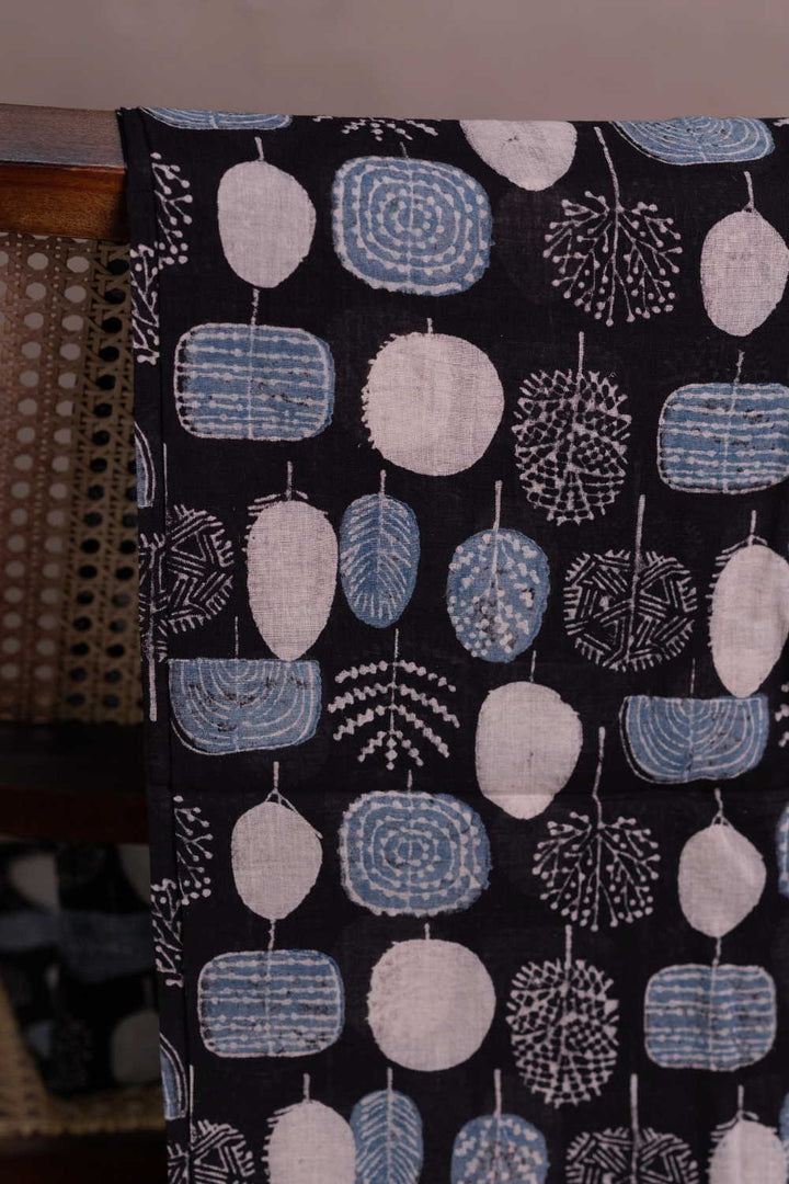 Motifs on Black Ajrak Mul Cotton Fabric