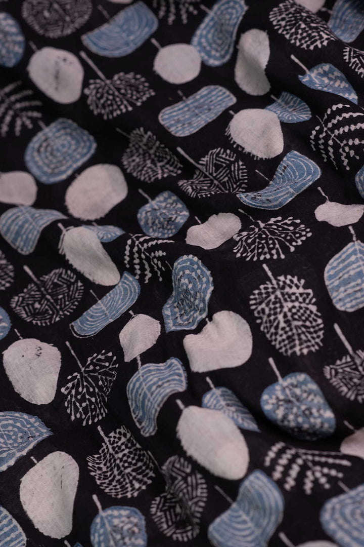 Motifs on Black Ajrak Mul Cotton Fabric