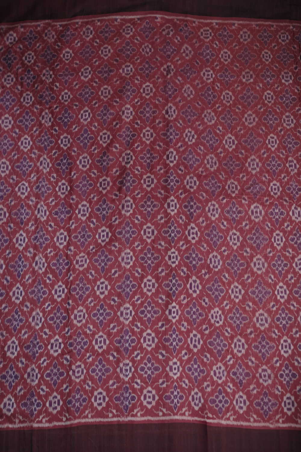 Floral Design on Maroon Orissa Ikat Cotton Fabric