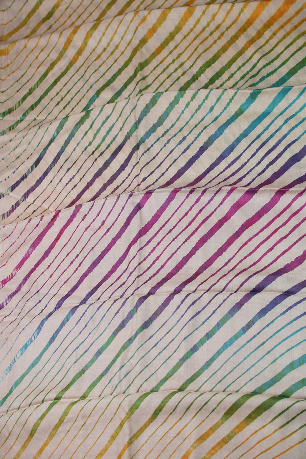 Rainbows on Cream Leheriya Tussar saree