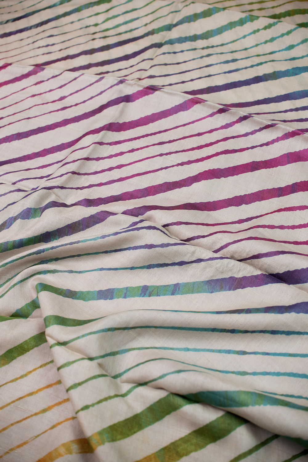 Rainbows on Cream Leheriya Tussar saree