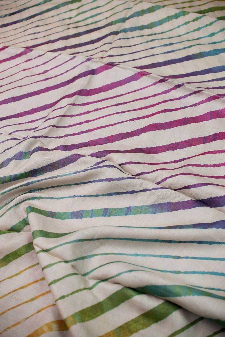 Rainbows on Cream Leheriya Tussar saree
