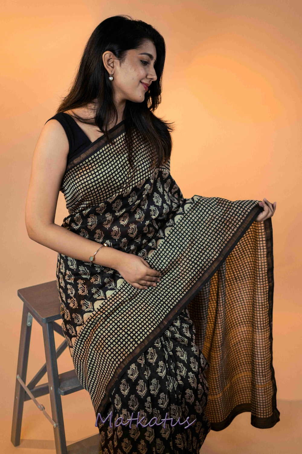 Motifs on Black Block Printed Chanderi saree