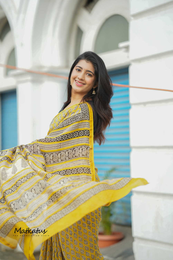 Motifs on Yellow Chanderi Silk Cotton saree