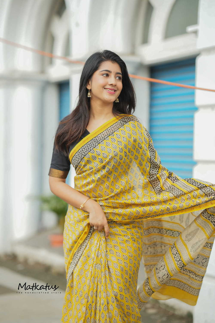 Motifs on Yellow Chanderi Silk Cotton saree