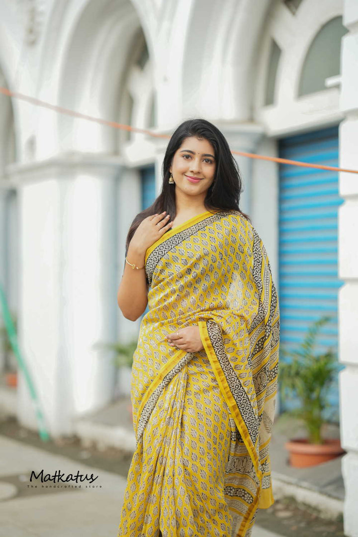 Motifs on Yellow Chanderi Silk Cotton saree