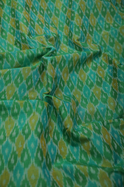 Motifs on Leaf Green Ikat Silk Cotton Fabric - 0.5m
