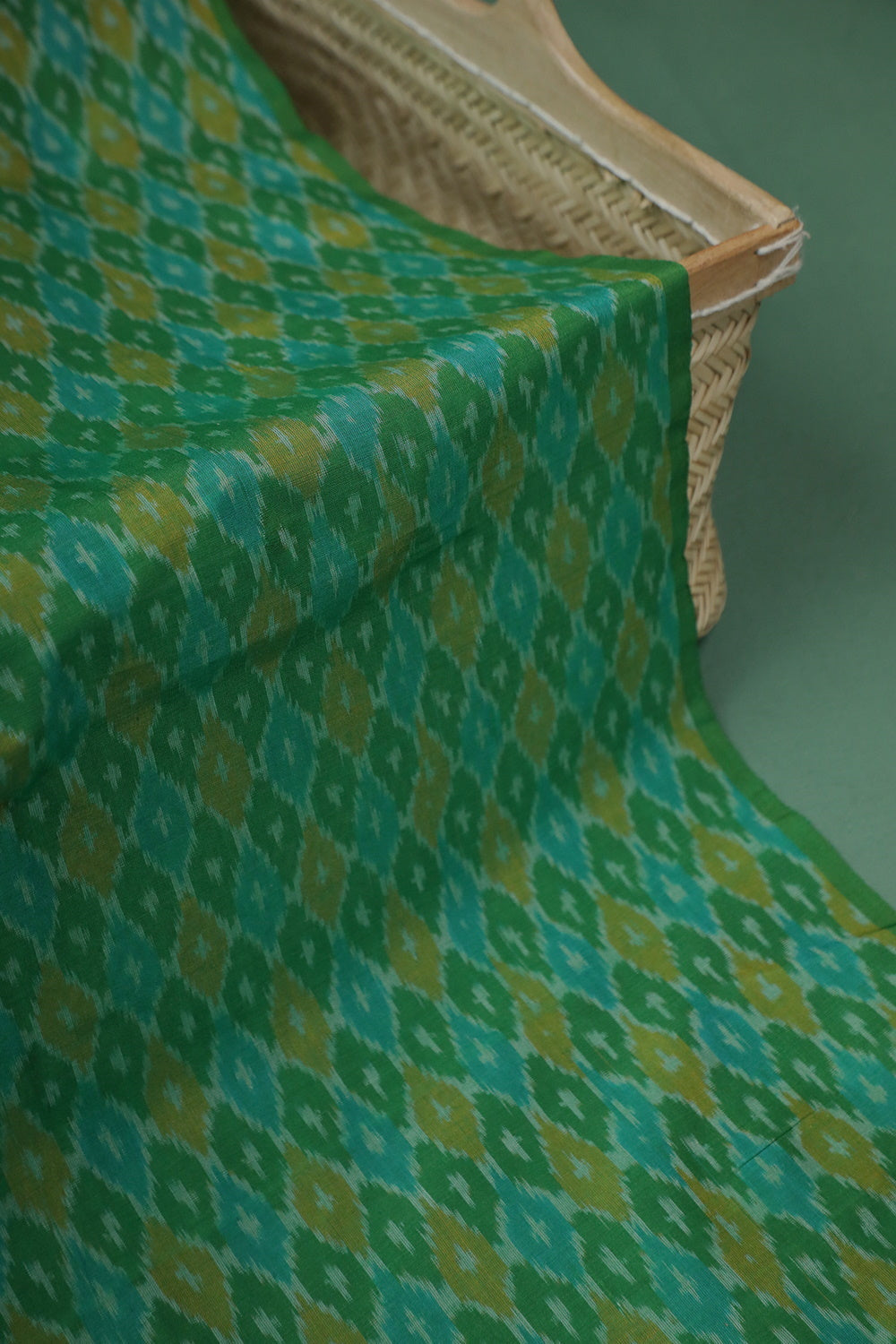Motifs on Leaf Green Ikat Silk Cotton Fabric - 0.5m