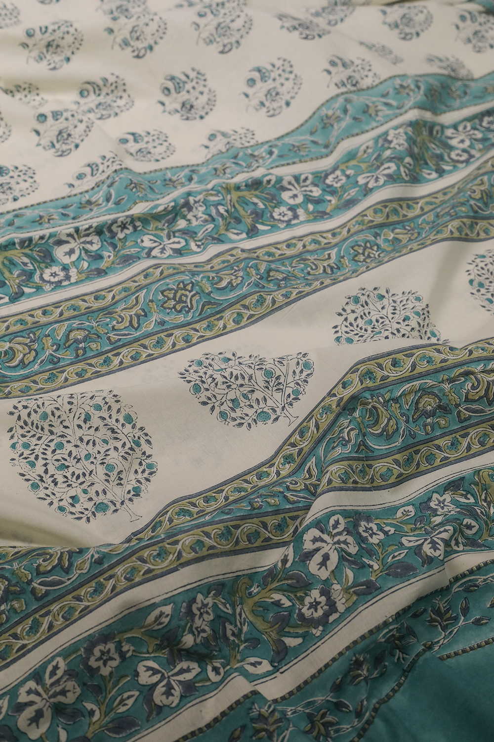 Prettiest Butta on Cream Block Printed Mul Cotton saree