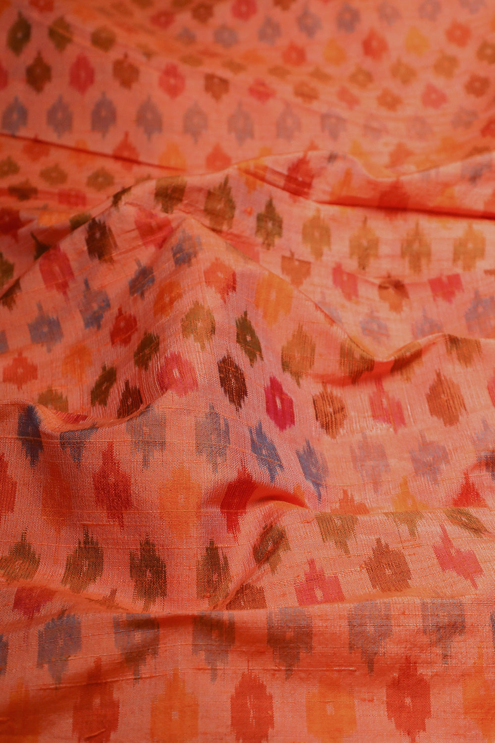 Orange with Motifs Ikat Raw Silk Fabric